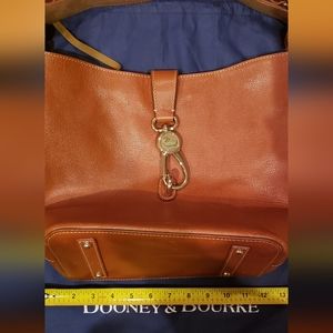 Dooney & Bourke shoulder bag with brass clasp